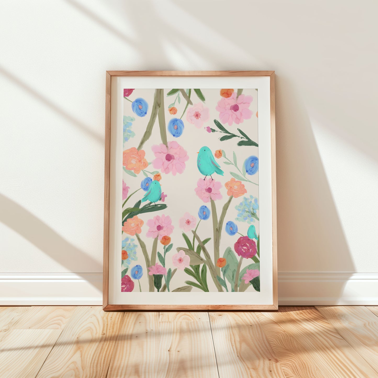 Illustrated floral art print featuring vibrant pink, orange, and blue flowers with green stems, accompanied by cute turquoise birds perched on blossoms, set against a soft cream background.