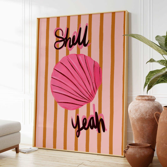 Painterly pink seashell art print with bold handwritten text "Shell Yeah". On a mustard yellow and pink striped background