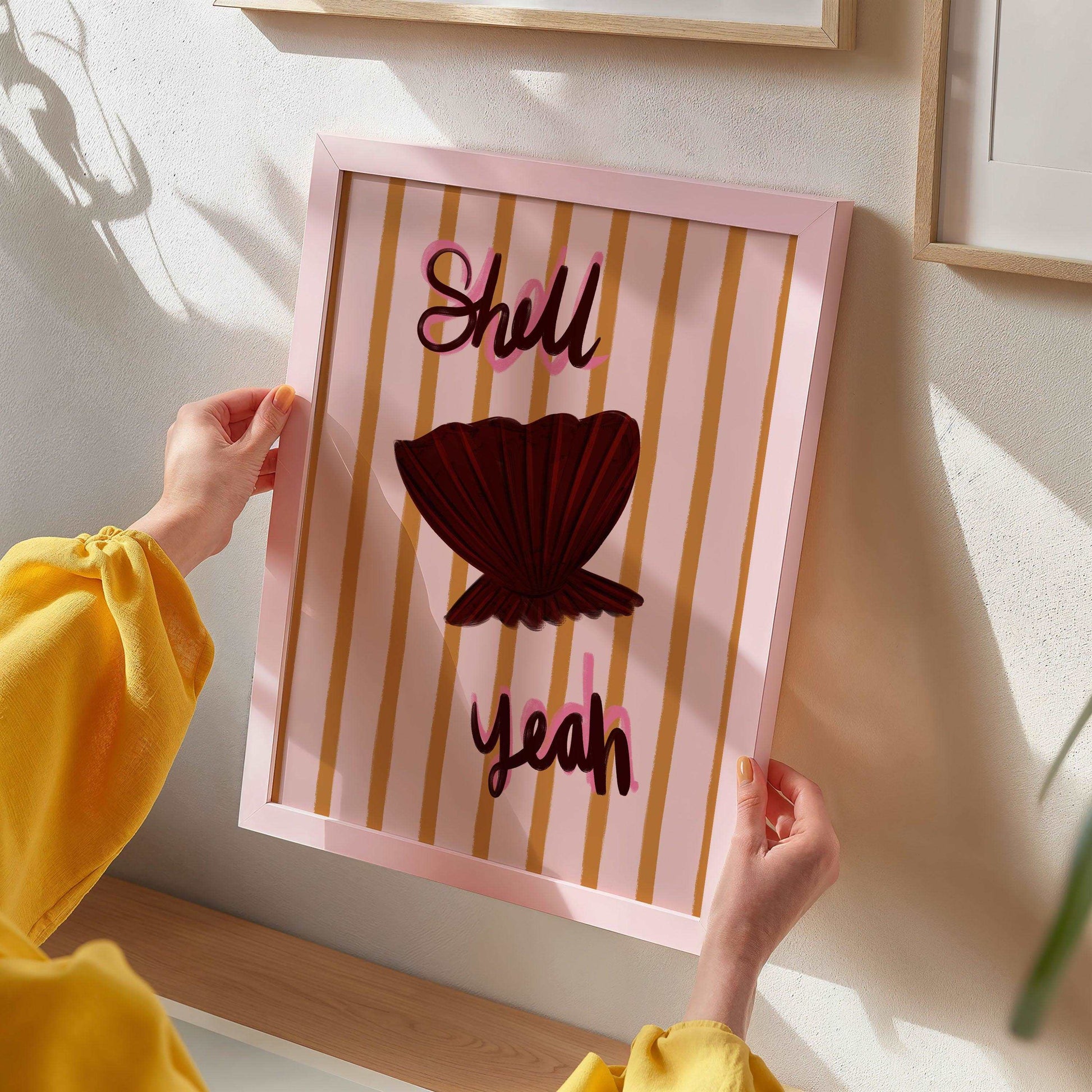 Painterly seashell wall art print featuring "shell yeah" handwritten text on a striped background