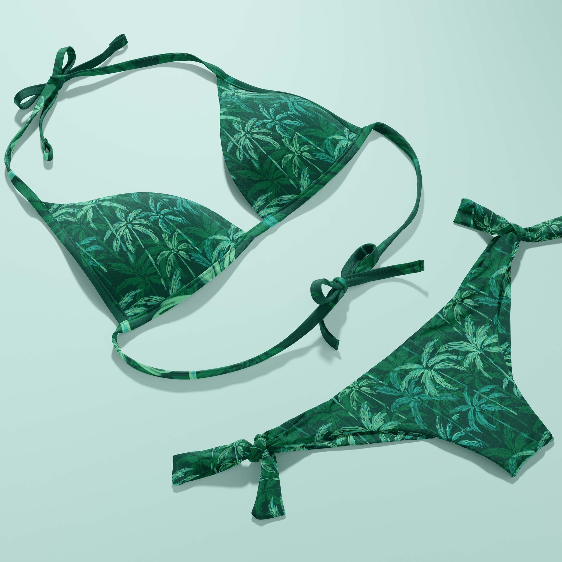 Abstract palm trees pattern on a string bikini