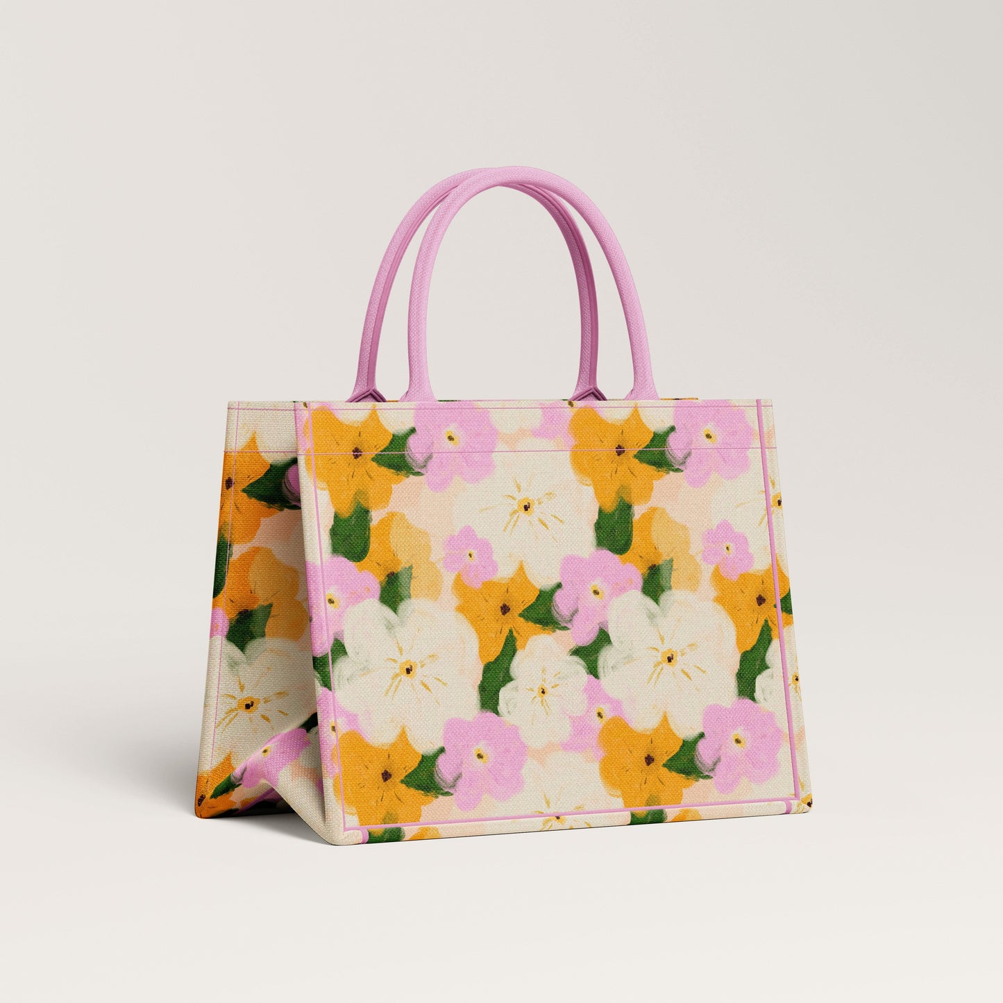 Yellow, pink and cream summer floral textile print design on a canvas tote bag