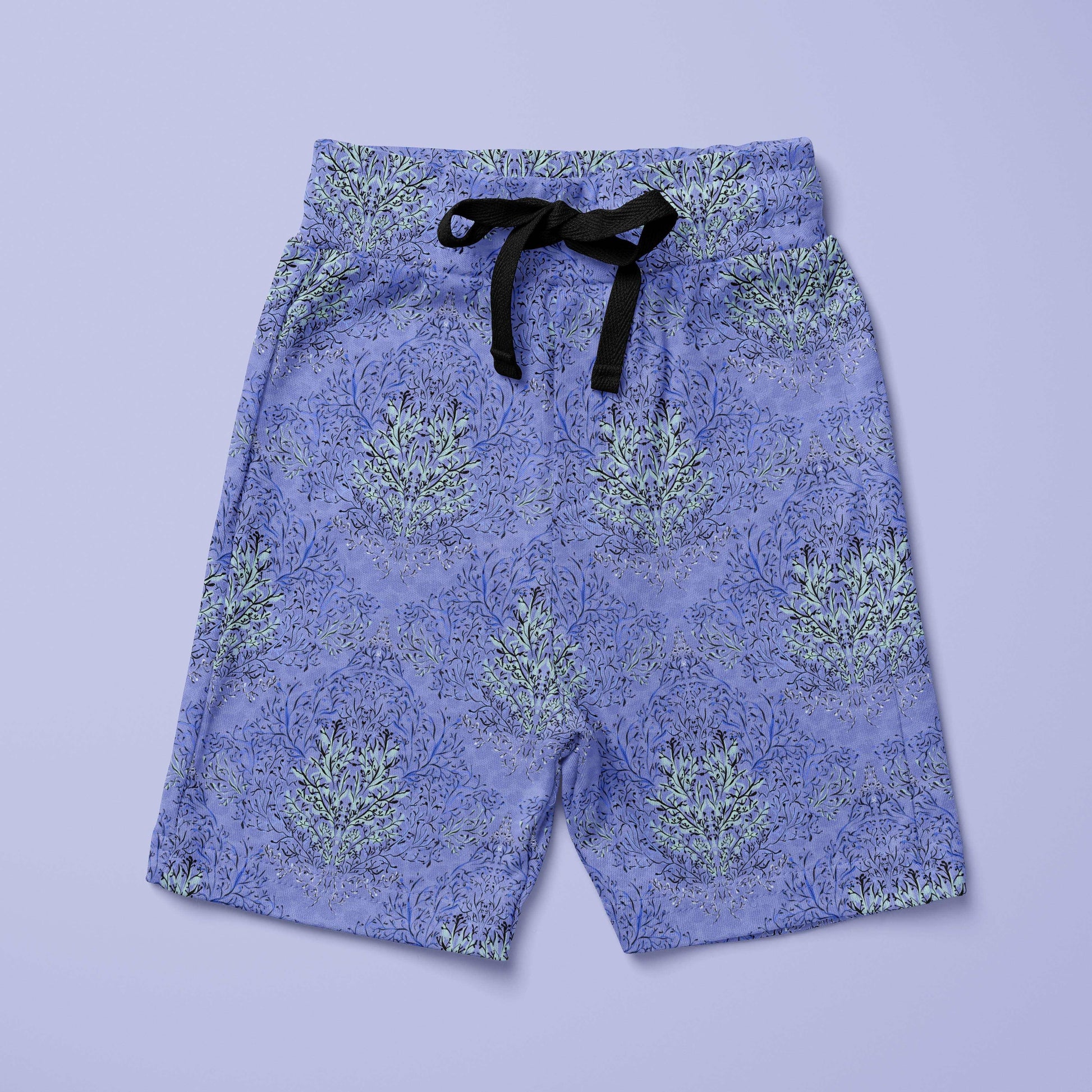 Blue coral fabric pattern on a pair of board shorts