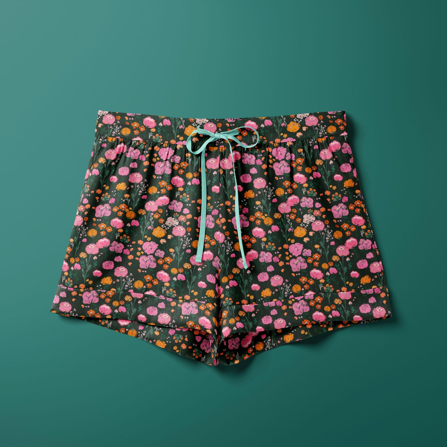 Dark blooms textile pattern on silk pyjama shorts