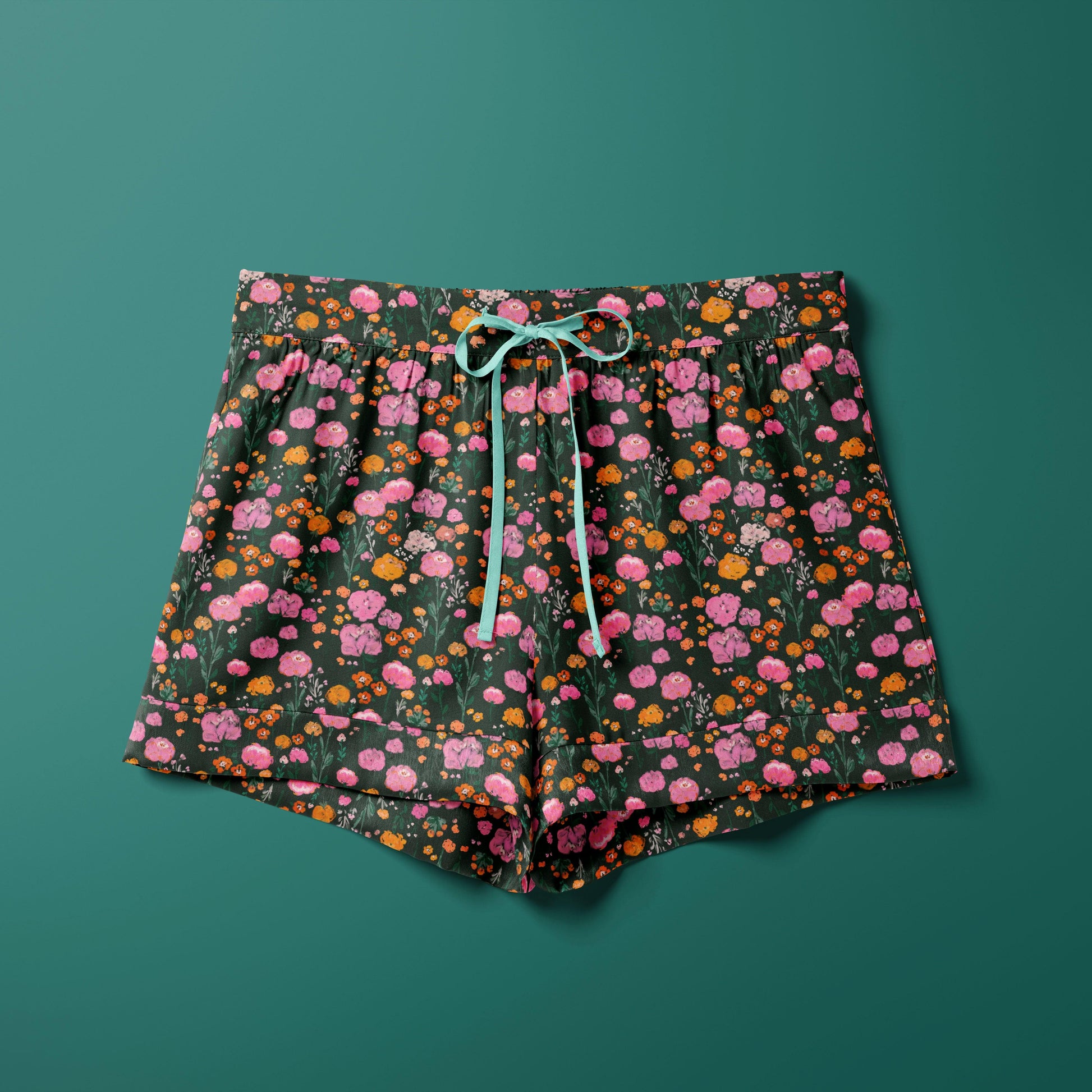 Dark blooms textile pattern on silk pyjama shorts