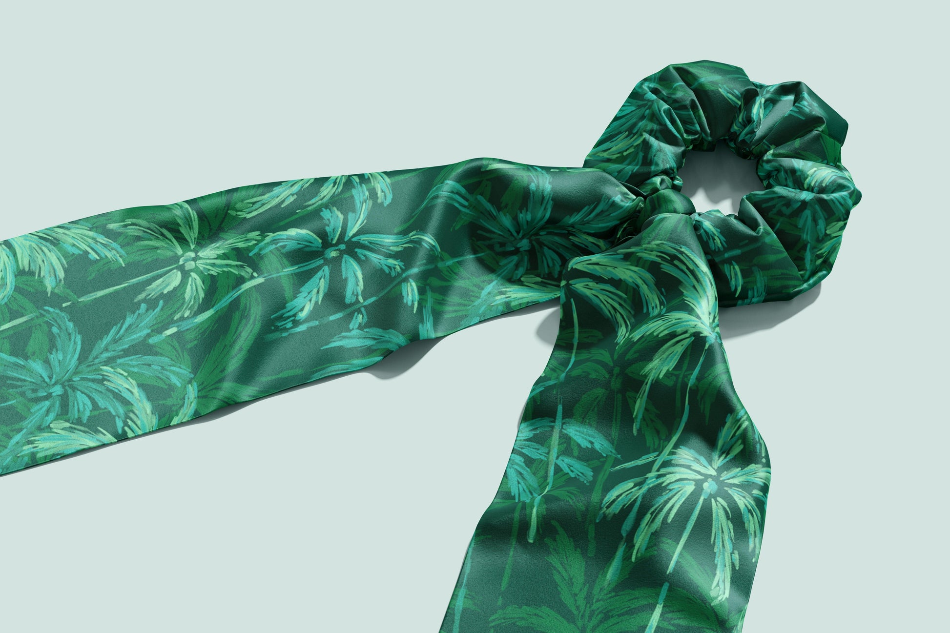 Abstract palm trees pattern on a silk scrunchie