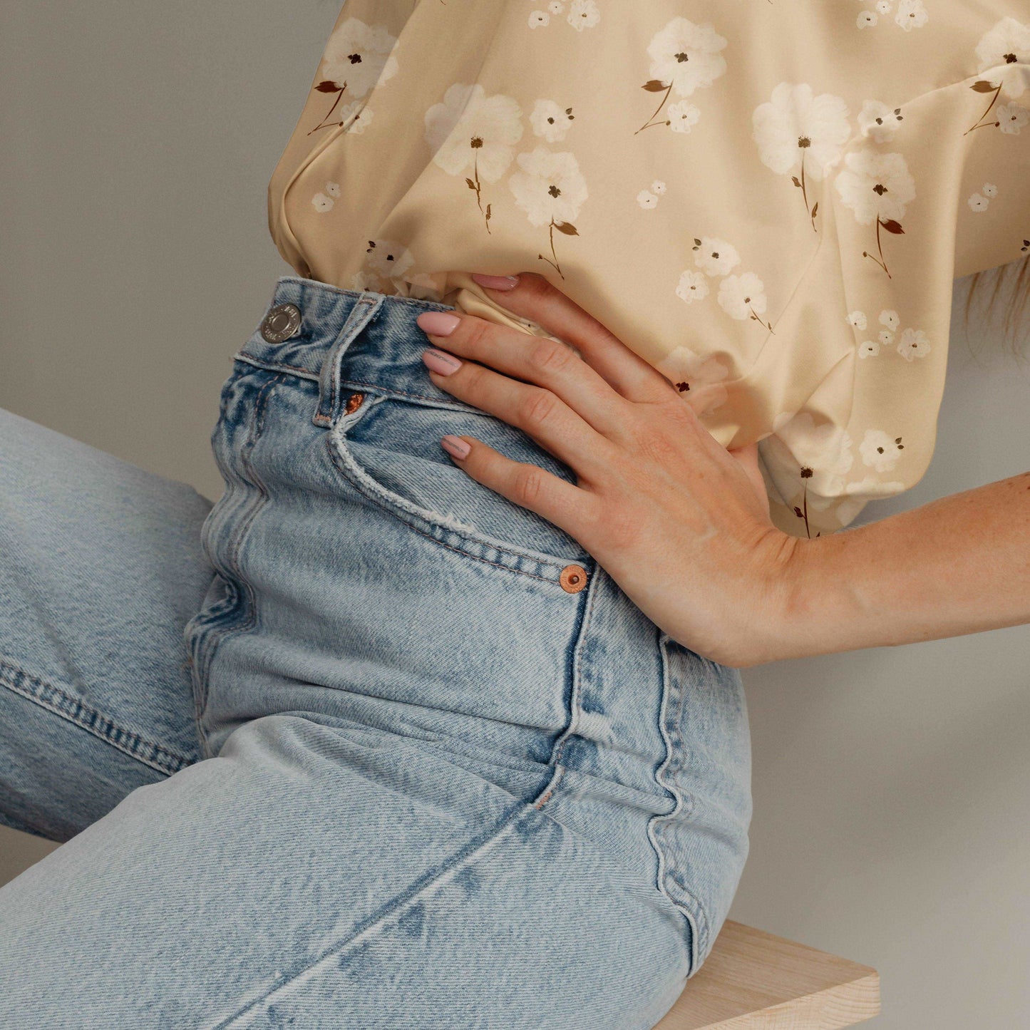 Ivory floral textile design on a silk shirt