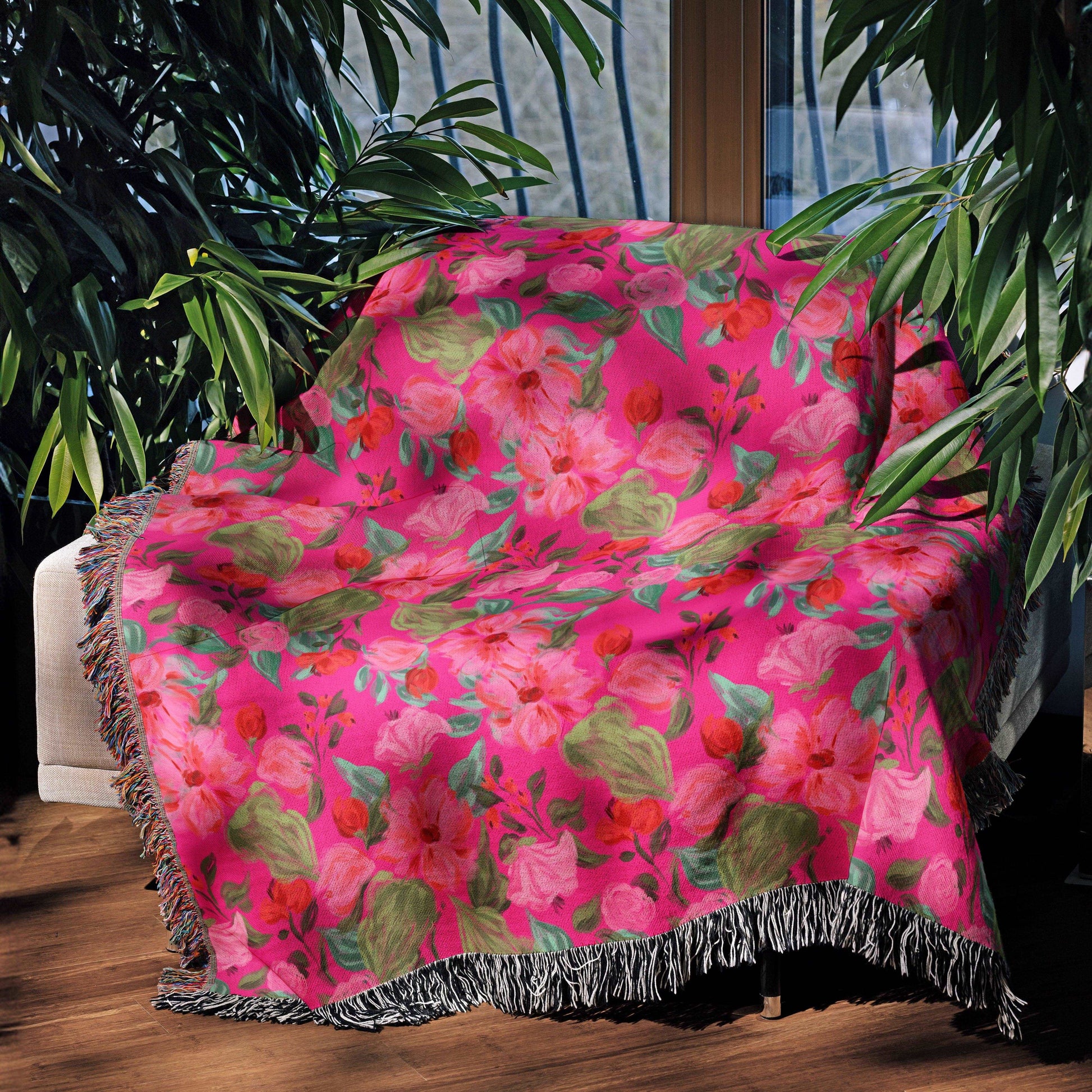 Pink floral surface pattern design on a throw