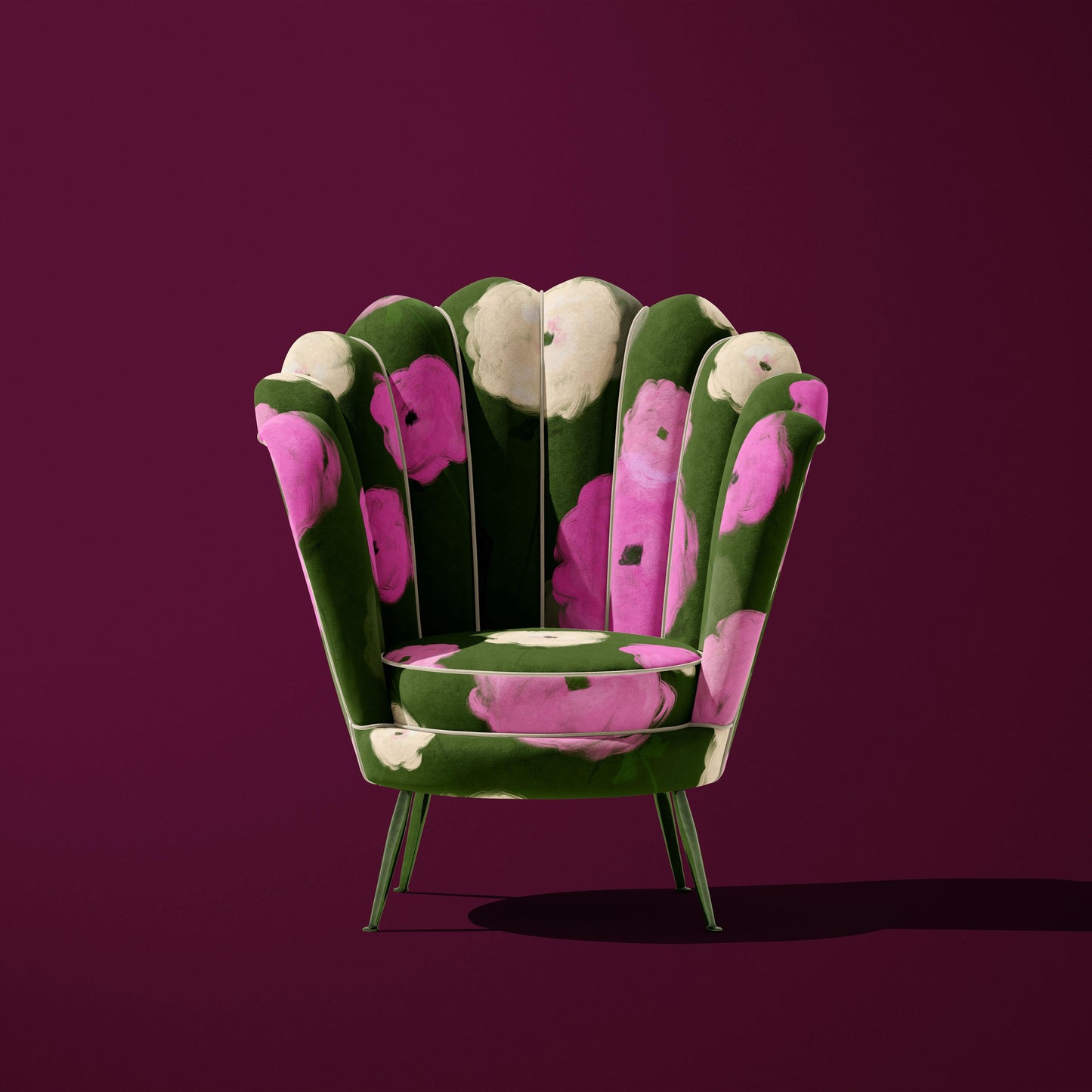 Green, pink and ivory flowers pattern on a velvet armchair