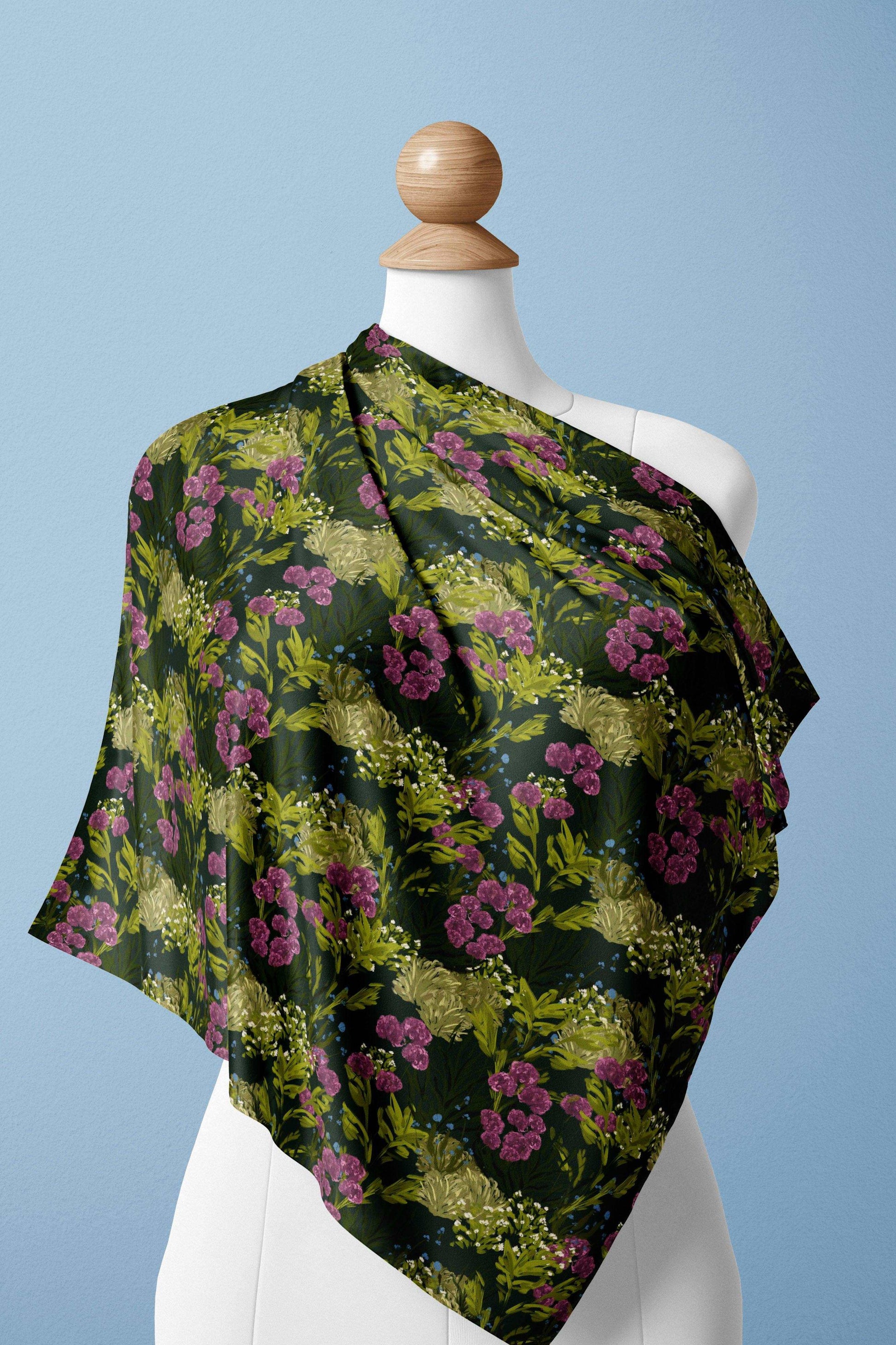 Dark botanical woodland pattern on a silk scarf